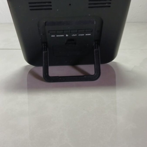 Digital table clock used with temperature display