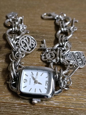Women's stainless steel charm bracelet watch new