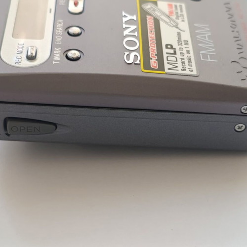 Sony MD Walkman MZ-G750 with remote, 5 discs, power supply, and battery