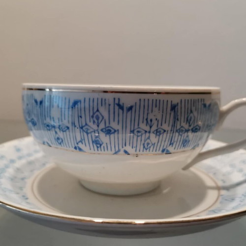 Set of two used Chinese tea cups with blue design and silver trim