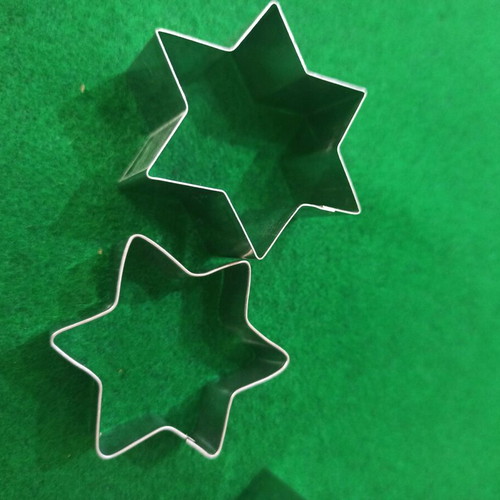 Cookie cutters with Christmas designs used