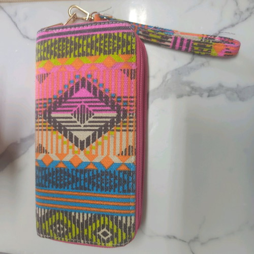 Ethnic wallet with colorful geometric patterns and wrist strap