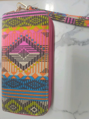 Ethnic wallet with colorful geometric patterns and wrist strap
