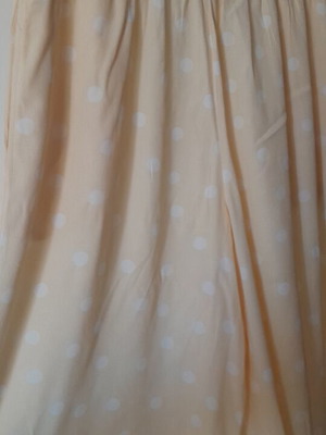 Women's palazzo pants like new, pale yellow with white polka dots