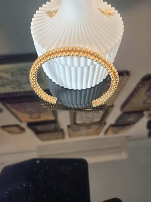 Metal bracelet gold color like new, slightly used