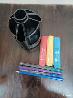 Rotating plastic pencil holder like new with contents