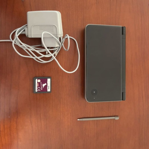 Nintendo Dsi XL like new with Nintendogs card, charger, and stylus