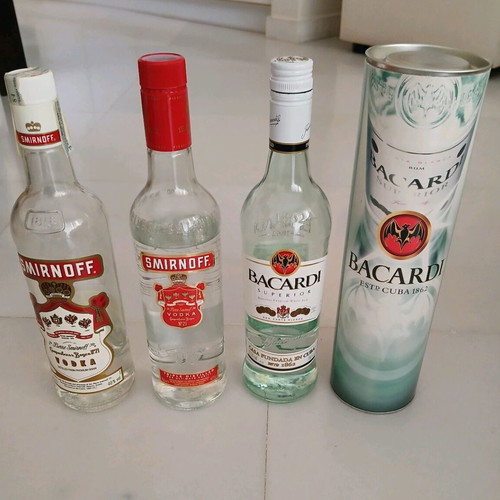 Pack of 2 old drinks, 1 vodka and 1 Bacardi, like new