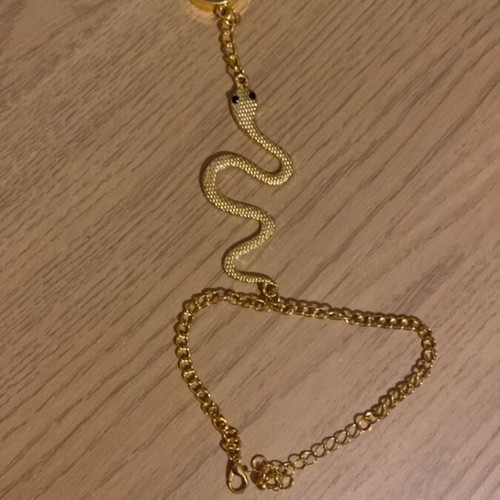 Gold bracelet with snake ring like new