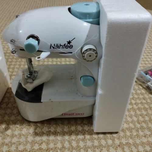 Mini sewing machine like new