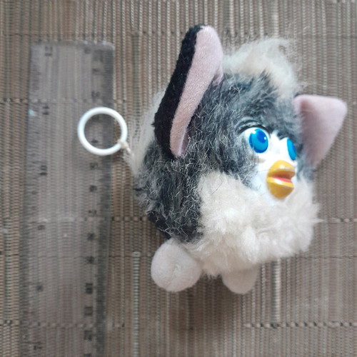Furby doll used, vibrating with pull string