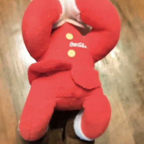 Collectible Coca Cola plush doll like new, 1990 Christmas edition