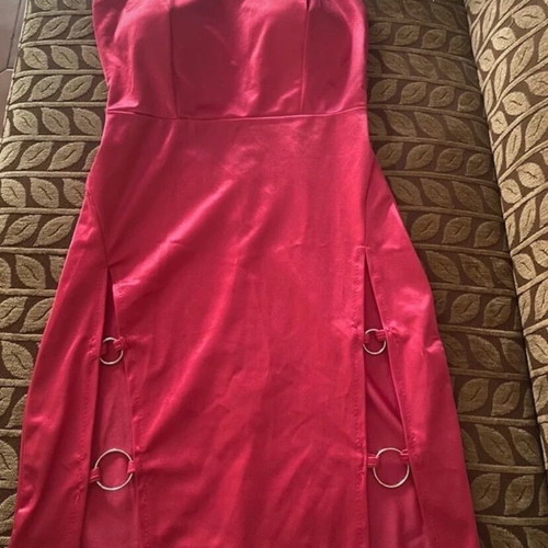 Satin pink mini dress like new with front details and open back