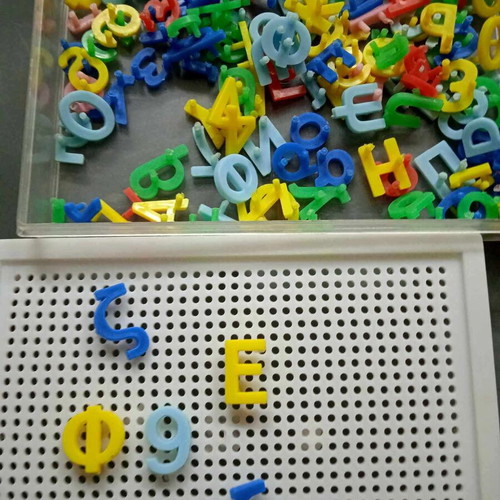 Vintage learning toy with numbers and letters used