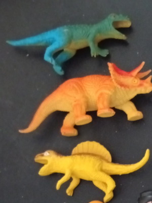 Vintage 1980s dinosaur figures T-rex green