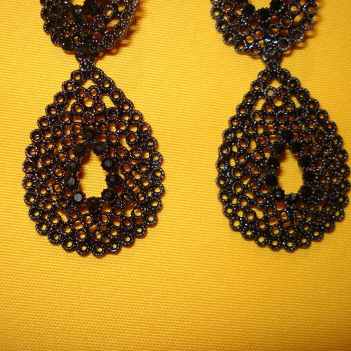 Vintage earrings dangle like new