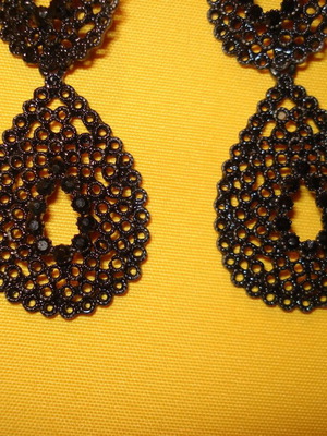 Vintage earrings dangle like new