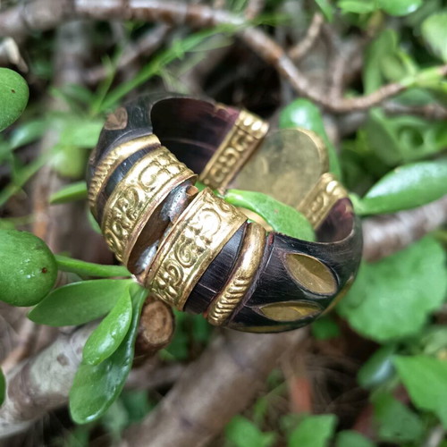 Wooden Boho bracelet used with bronze details and semi-precious stone