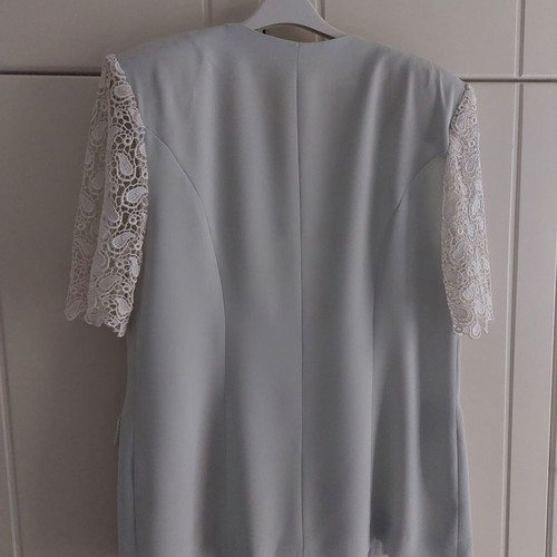 Women's jacket with lace sleeves used, size 50
