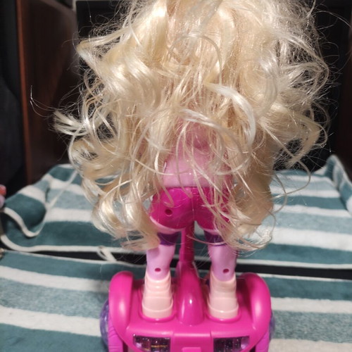 Doll with scooter, sound and lights, like new