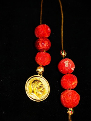 Indico Jewells handmade worry beads with 24K gold English lira and coral