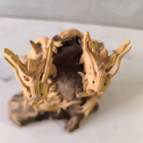 Wooden carved dragons used on wooden base