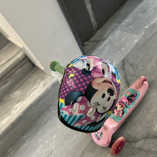 Minnie Scooter with Helmet like new, lightly used