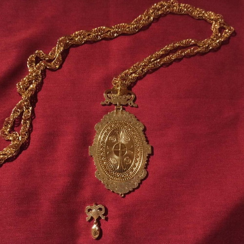 Religious pendant new gold-plated with small defect