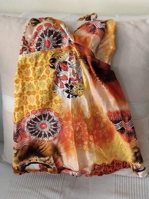 Backless tops size S like new with bow tie