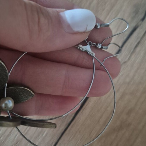 Hoop earrings used with metal flowers and pearl detail