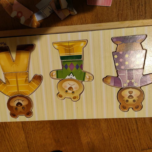 Melissa and Doug wooden puzzle like new with 3 figures and clothes
