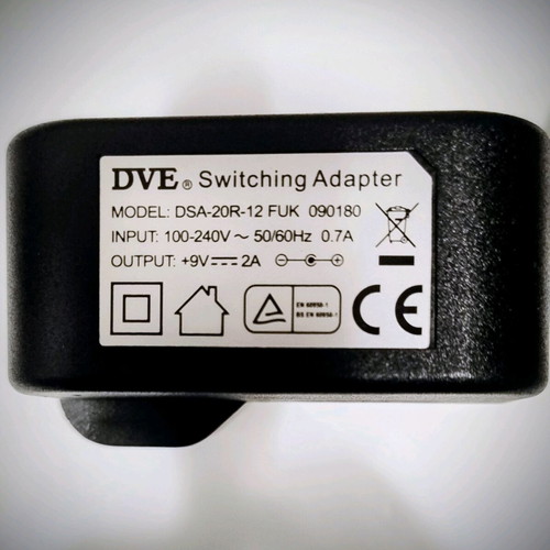 Power adapter 9V 2A like new with UK to Greek plug adapter
