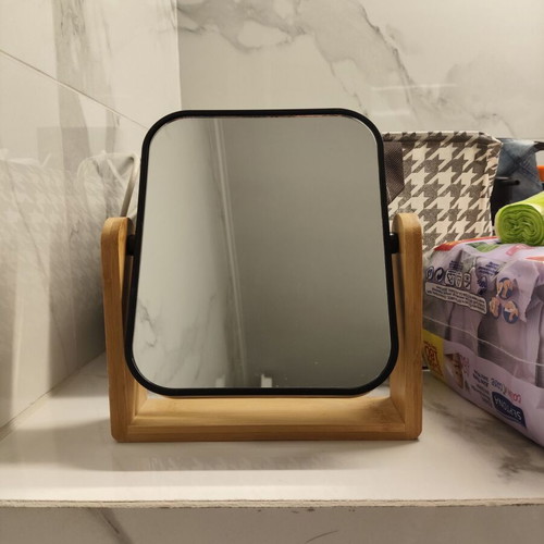 Two-dimensional tabletop mirror like new, rotating