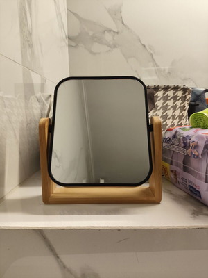 Two-dimensional tabletop mirror like new, rotating