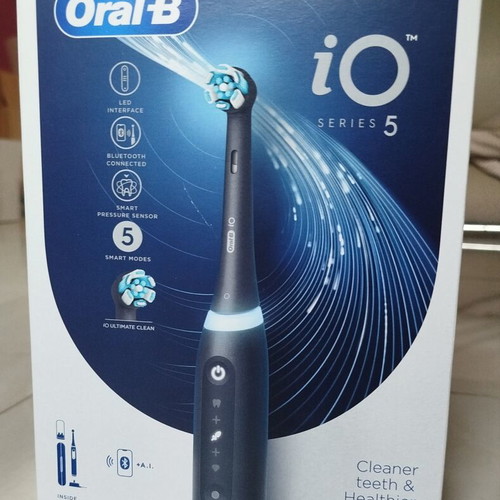 Oral-B iO Series 5 electric toothbrush with travel case