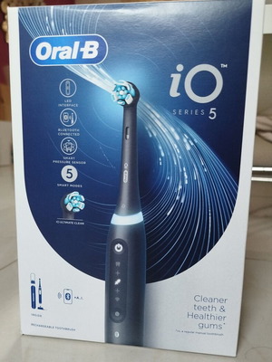 Oral-B iO Series 5 electric toothbrush with travel case