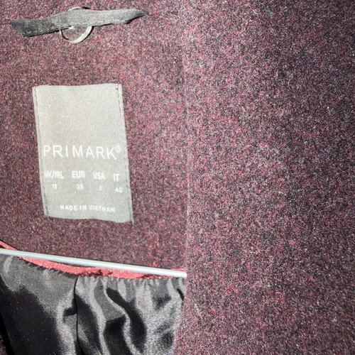 Primark winter coat like new, eggplant with black details
