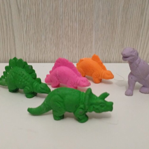 Vintage rubber dinosaur figures set used, 1980s monochrome erasers