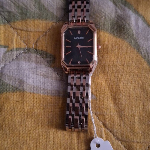 Wristwatch new with rose gold and silver bracelet
