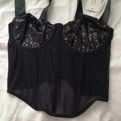 Women's black bustier corset top with sequins and sheer waist