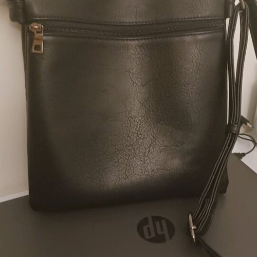 Angel crossbody bag like new, black with 6 separate compartments