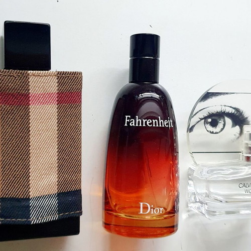 Empty Dior Fahrenheit, Calvin Klein Woman, Burberry London perfume bottles used