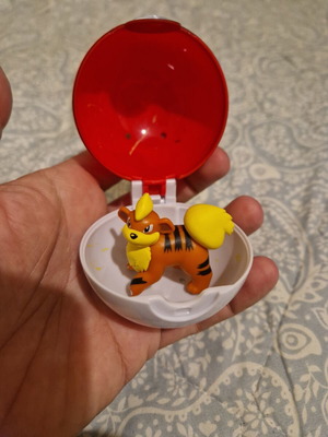 Growlithe figure with Poké Ball clip used