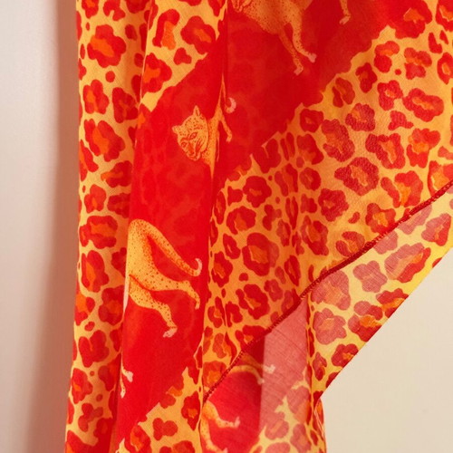 Transparent animal print pareo like new, orange and yellow
