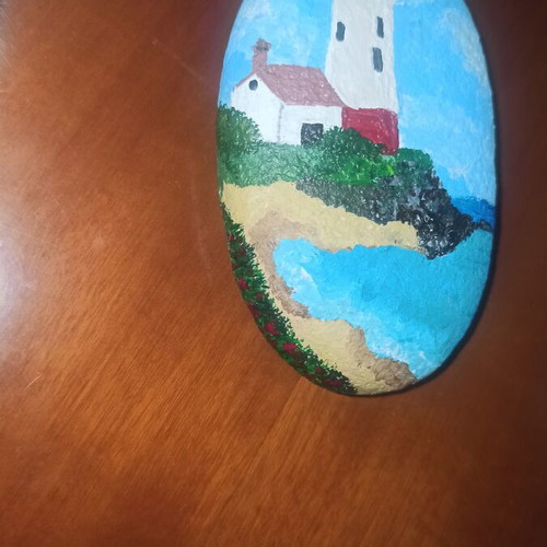Hand-painted lighthouse stone with acrylic colors