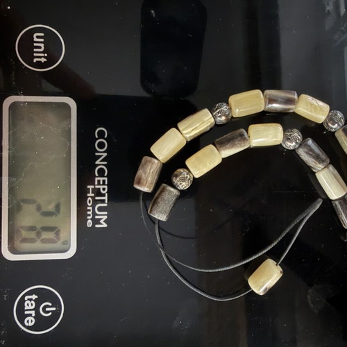 Worry beads used, black and white goat horn beads
