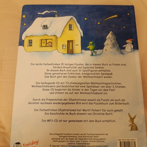 Christmas book with 15-piece puzzle and figures used