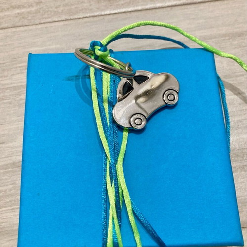 Gift box new with ribbon and car keychain