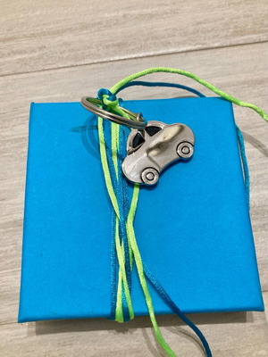 Gift box new with ribbon and car keychain