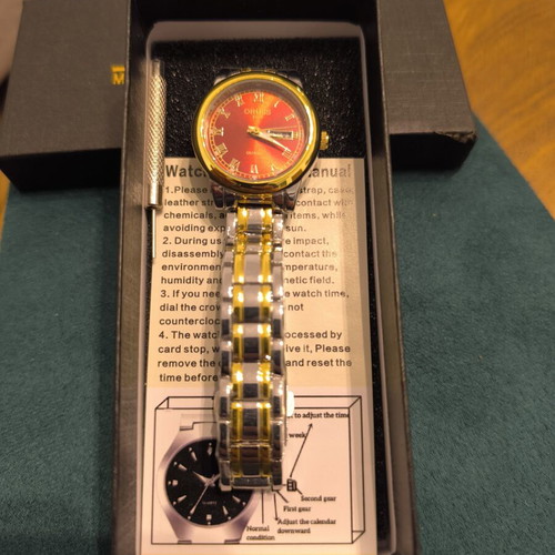 Oruss 1853 Quartz women's watch new with red dial and two-tone bracelet